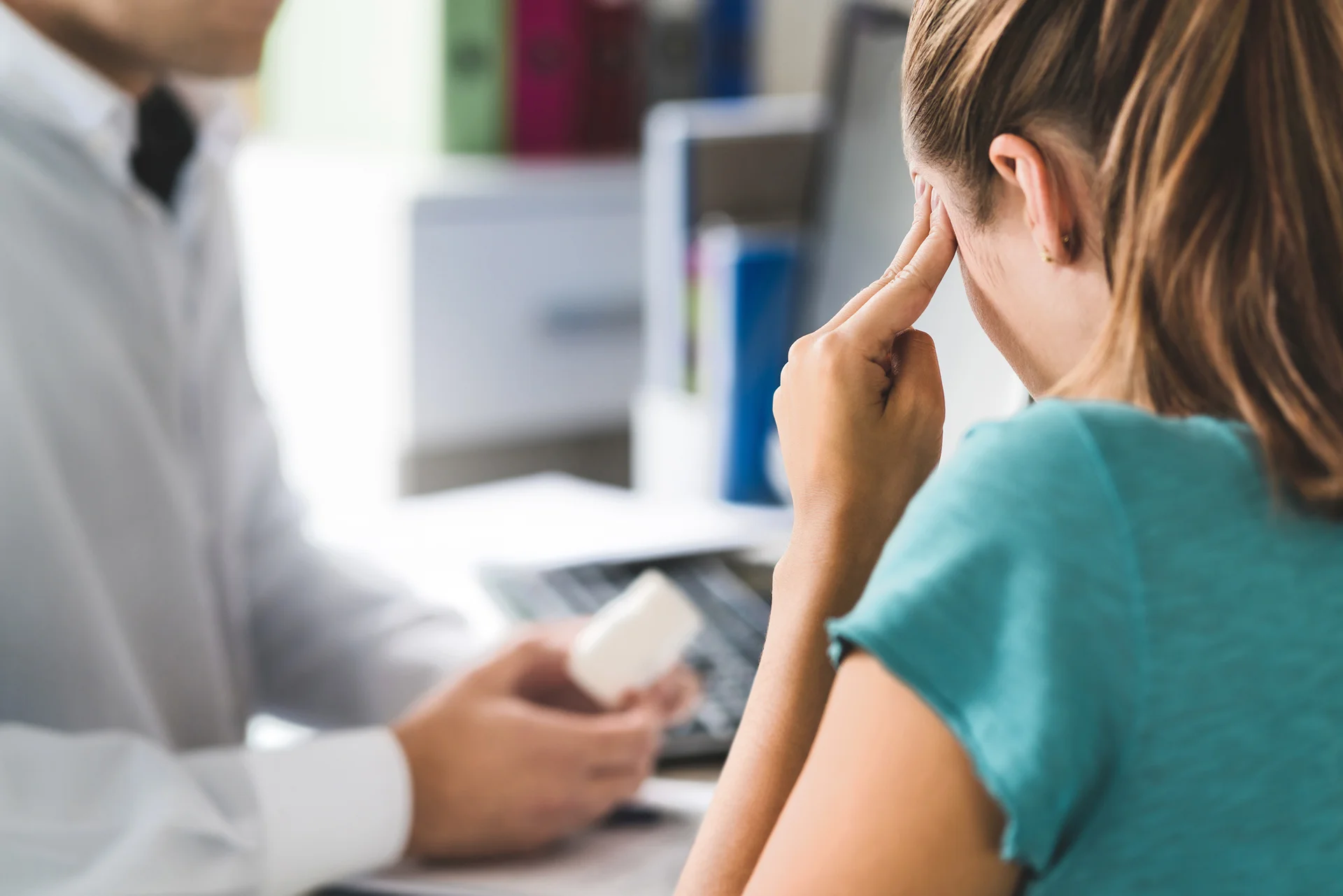 patient and doctor consultation about migraine