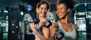 two ladies had fun working out at the gym