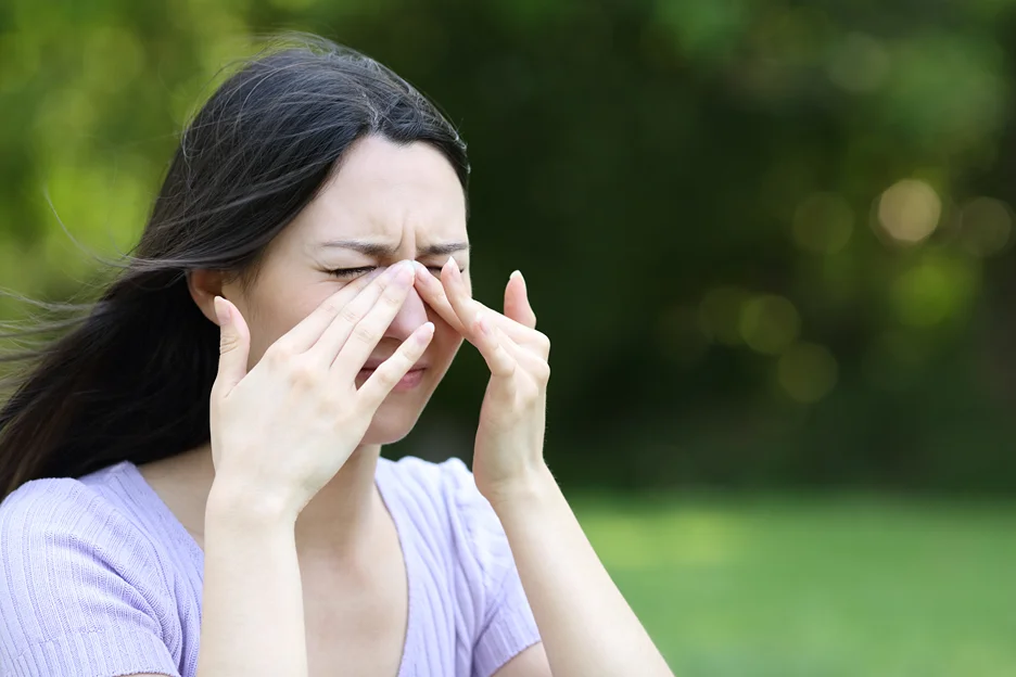 a woman has an allergy attack