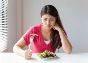 a woman with low appetite